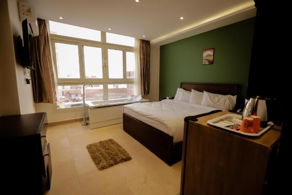 Kafret el-Gabal Topaz Pyramids View Inn מראה חיצוני תמונה
